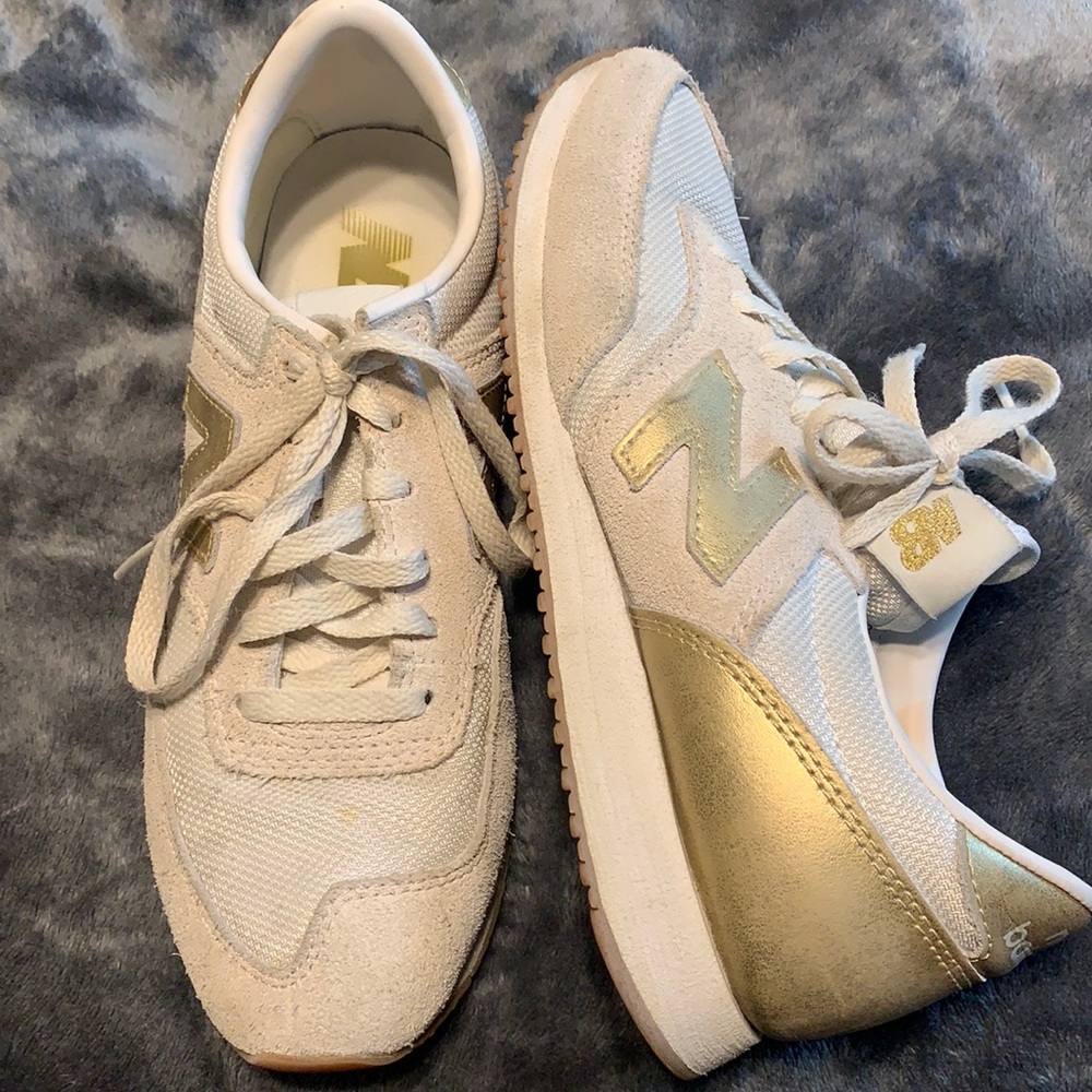 New Balance white and gold sneakers